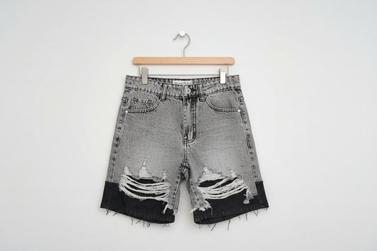 Jeans corto strappi